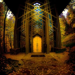 Glen Couvillion's fine art photography series, "Seasons of Serenity," offers four captivating variations of the iconic Thorncrown Chapel building nestled amidst the splendor of early fall. Each image beautifully encapsulates the chapel's renowned architecture and the surrounding landscape's shifting moods.